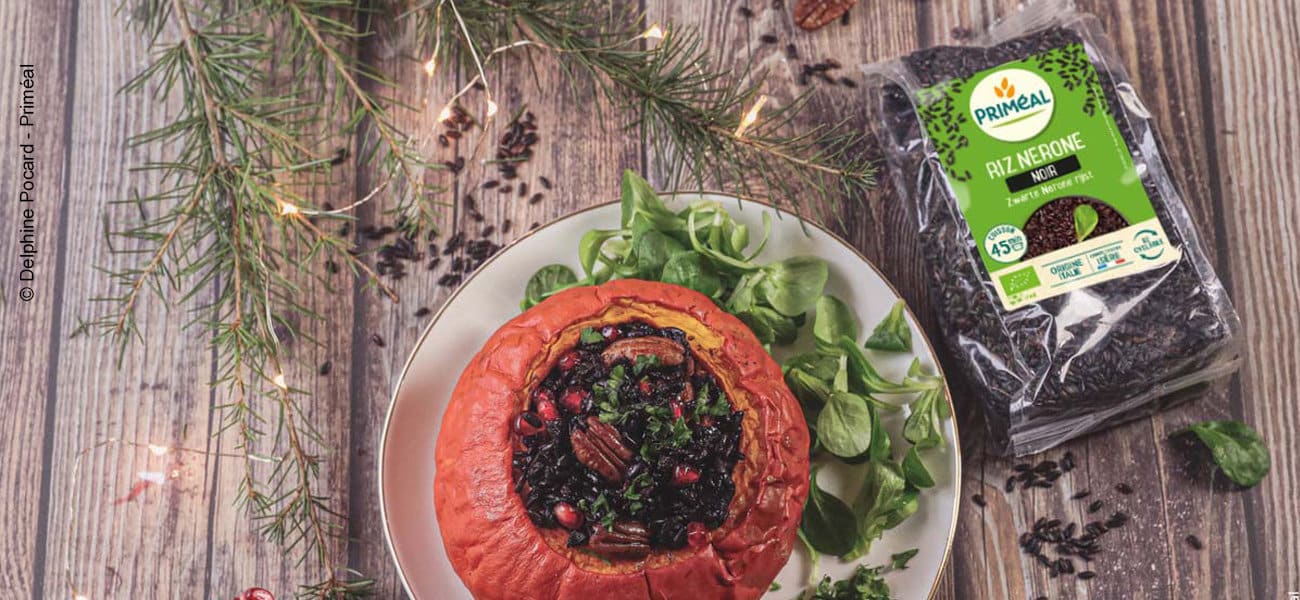 Courge farcie au riz noir, grenade et champignons